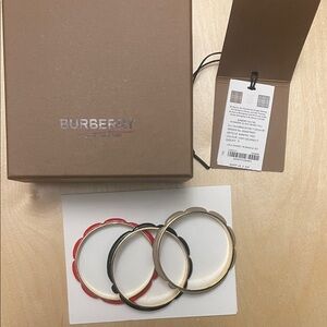 Burberry Red, Black, and Gold Bangle Trio